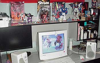 Ron's desk decked out with anime figures